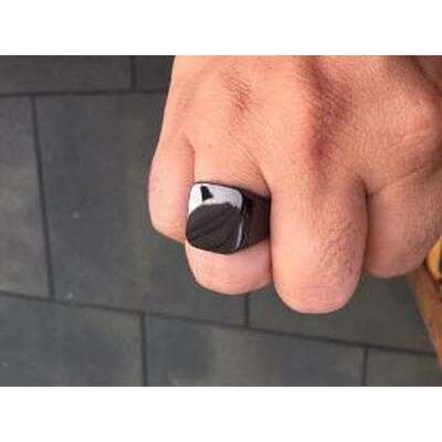 a ring with a stone on it.