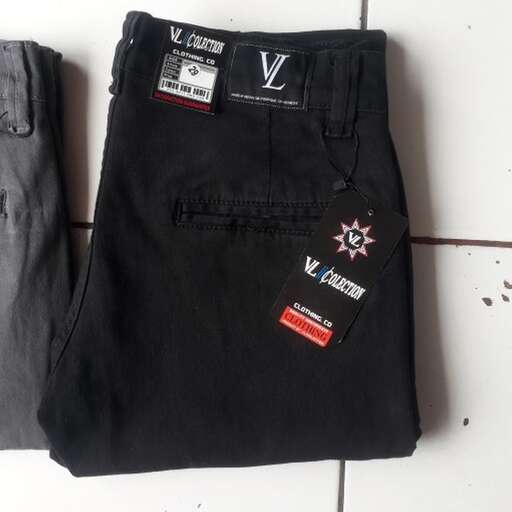 a pair of black jeans with a blank label on the front.