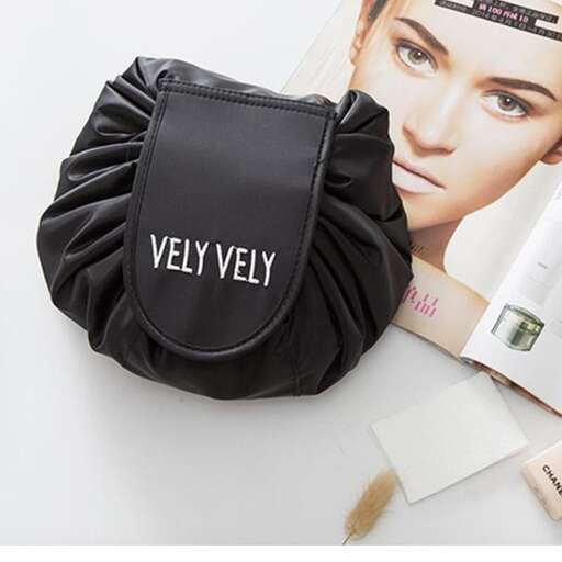 a black and white bag with a white label.