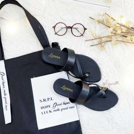 a bag with a pair of glasses and a pair of glasses.