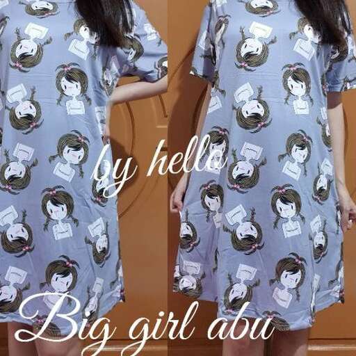 a girl's short sleeved shirt with a cute design.