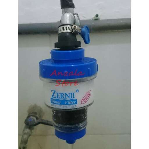 a water pump with a blue cap and a black cap.