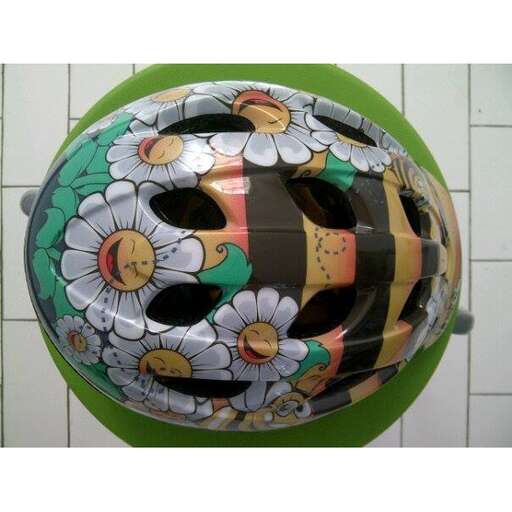 a round ball with flowers painted on it.