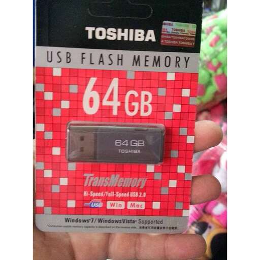 a battery in a person's hand