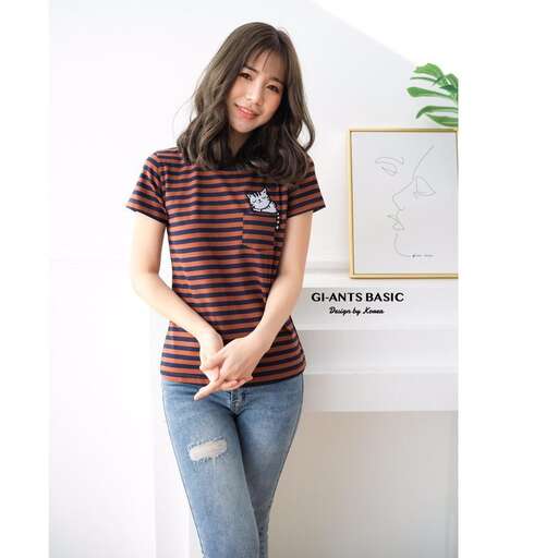 a striped tee with a name tag on the front.