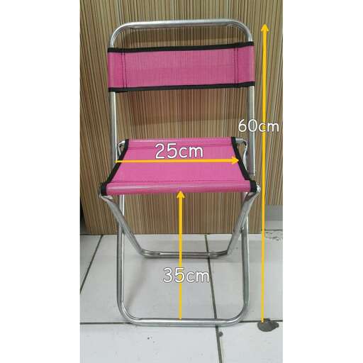 a chair with a pink seat and a yellow tape measure.