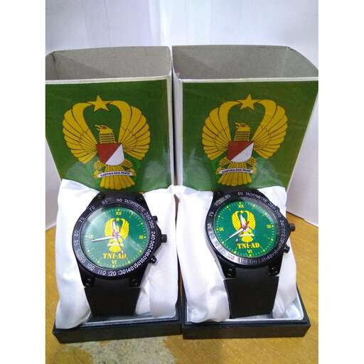 a pair of new watches are displayed on display.