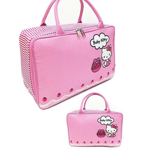 pink and white polka dots bag with a cute little girly design.