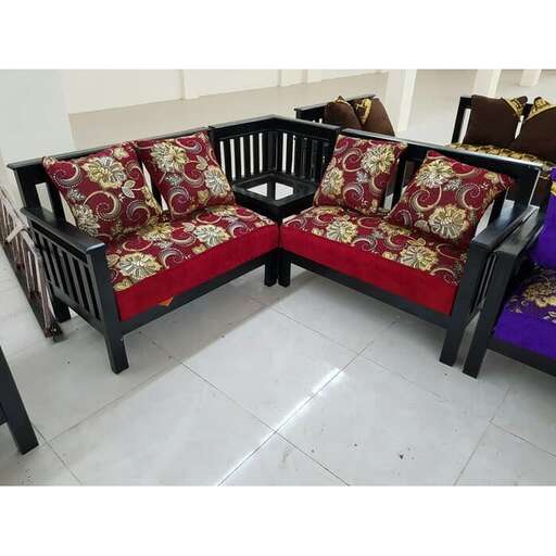 a pair of chairs with a black and red cushion.