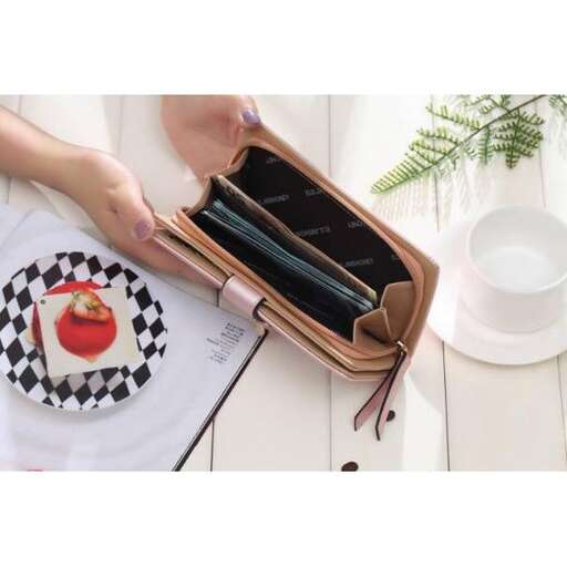 a person holding a knife and fork in a case.