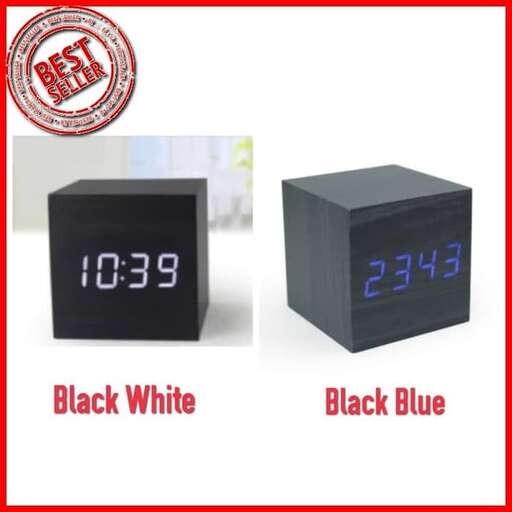 a black clock with blue and white face and a black background