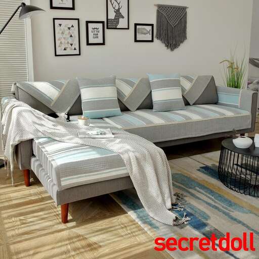 a bedroom with a bed and a rug on the floor.