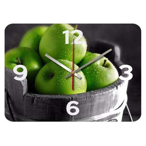 a green apple with a clock showing the time