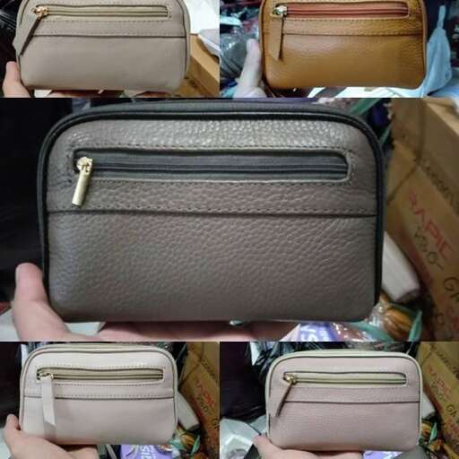 a small leather case with a zipper.