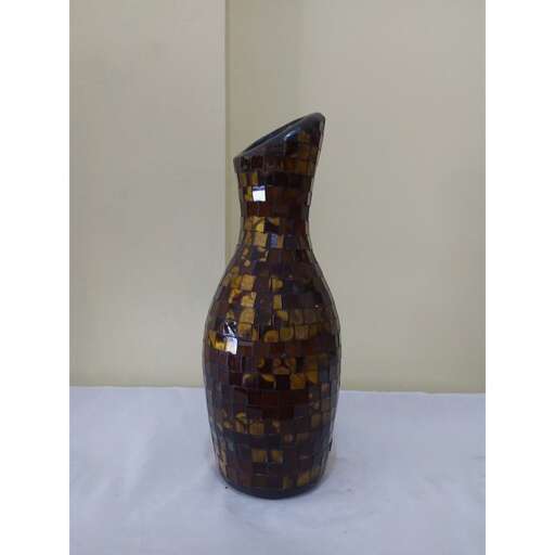 a large brown vase with a broken top.