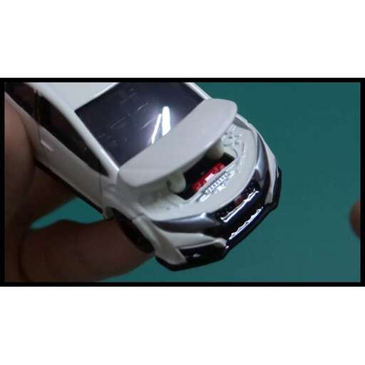 a person holding a cell phone with a screen.