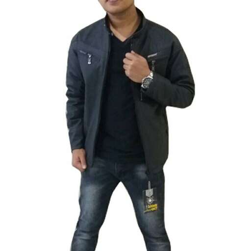 a man in a black shirt and jeans.