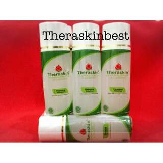 a box of product that is white, red and green.