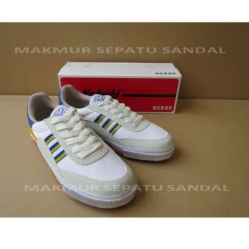 custom size men's white canvas shoes with blue stripes. size 8 in size.