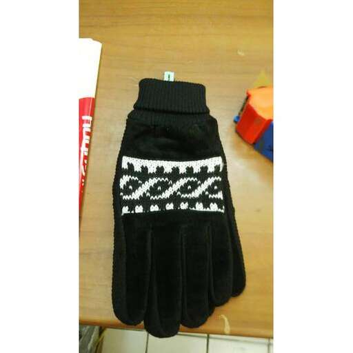 black and white knitted skirt with a knitted sweater.