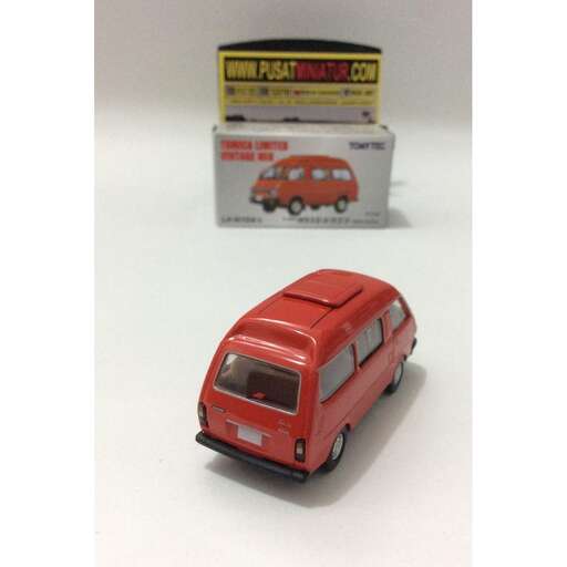 a toy car with a box of toys