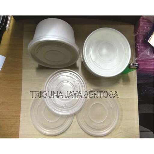 a table with three bowls and a bowl on it.