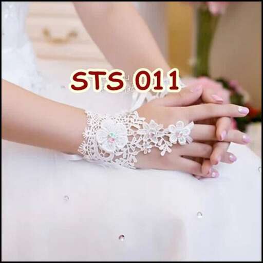 a bride's hand with a wedding band