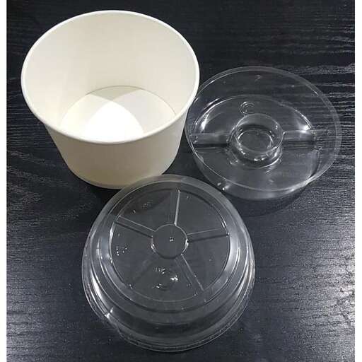 a bowl and bowl are sitting on a table.