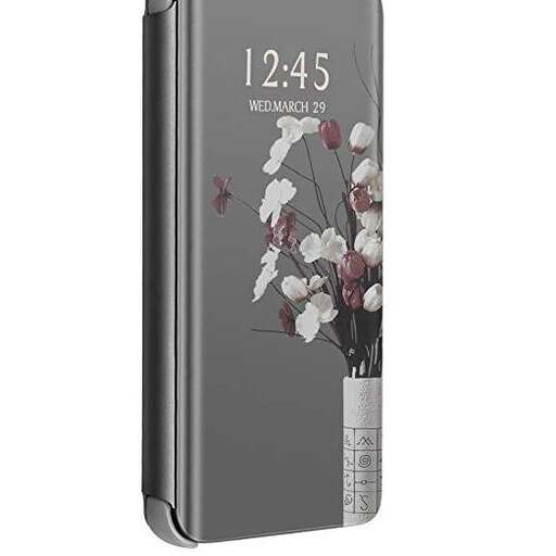 a smart phone with a glass vase on the side.