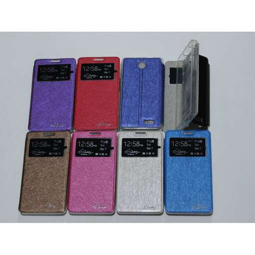 a group of different colored cell phones sitting next to each other.