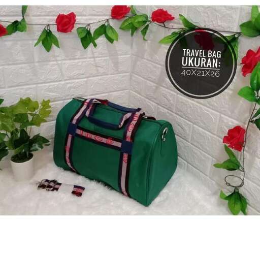 a bag of roses and a suitcase in a box