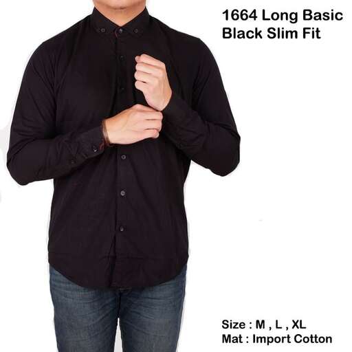 a man in a black shirt and jeans.