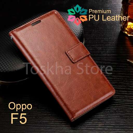 leather wallet with a leather cover and a gold buckle