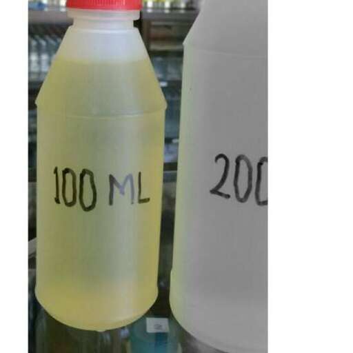 a bottle of water with a red cap.