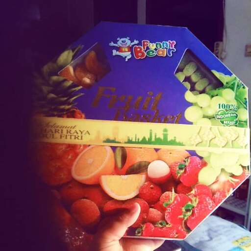 a box of fruit is holding a box of fruit.