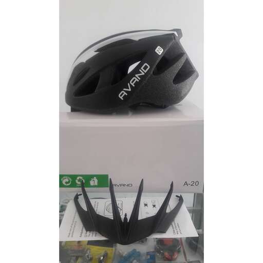 a helmet with a large blade on top of it.
