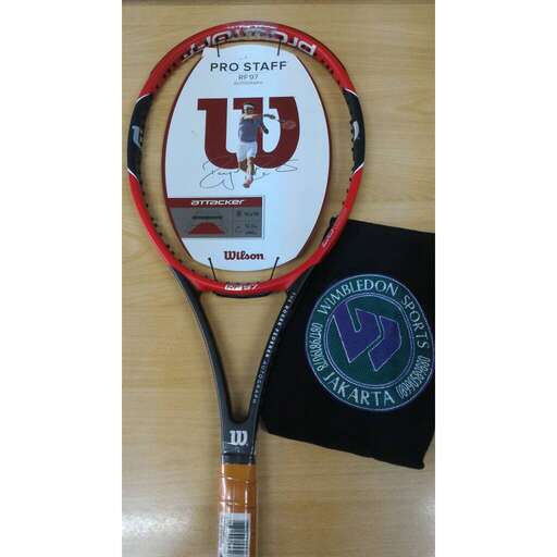 a tennis racket with a black handle and a black case