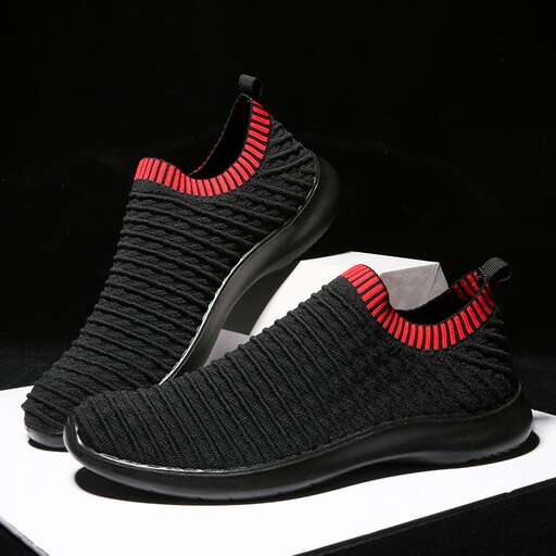 a pair of shoes designed by person