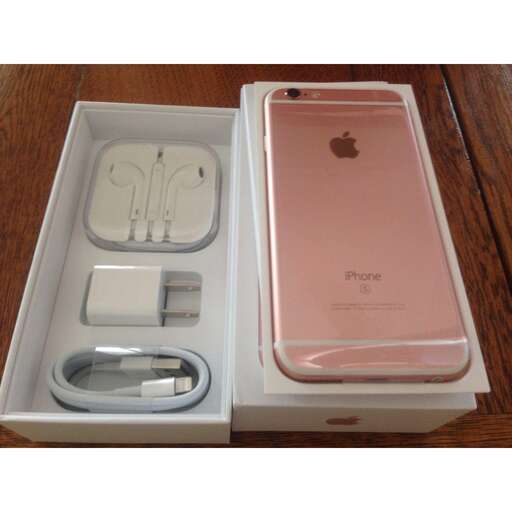 a box with a pink iphone inside of it.