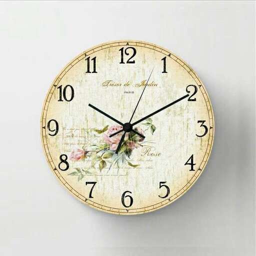 a clock with flowers on it