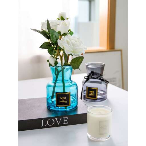 a candle and a candle on a table.