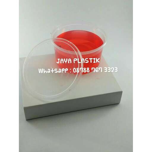 a box with a red liquid inside of it.