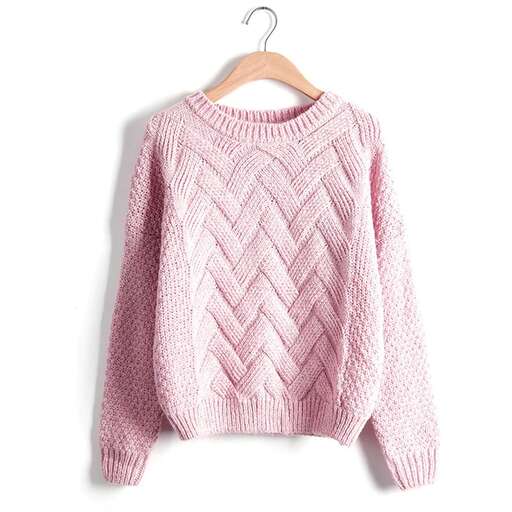 a pink sweater with geometric pattern on it