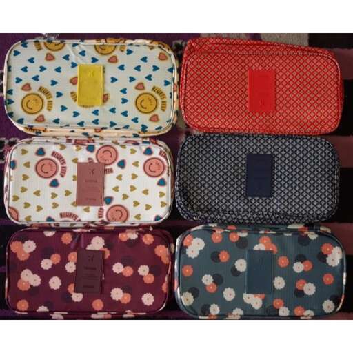 a group of different colored bags with different patterns.