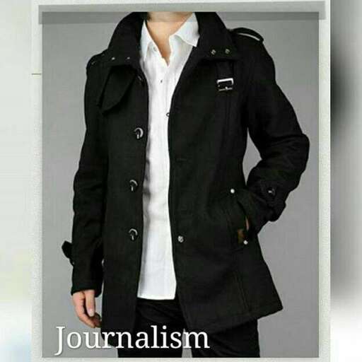 a black coat with a white shirt and black pants.