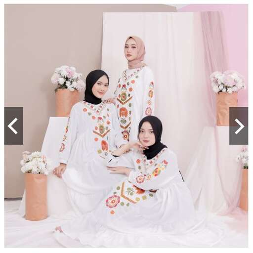 the bride and groom in white dresses