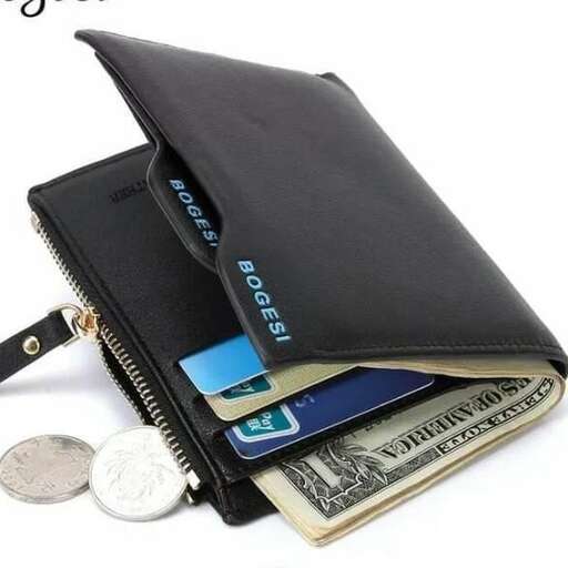 a wallet that has money in it and a coin in it.
