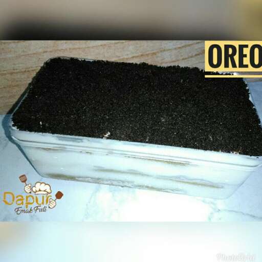 a container of black soil.