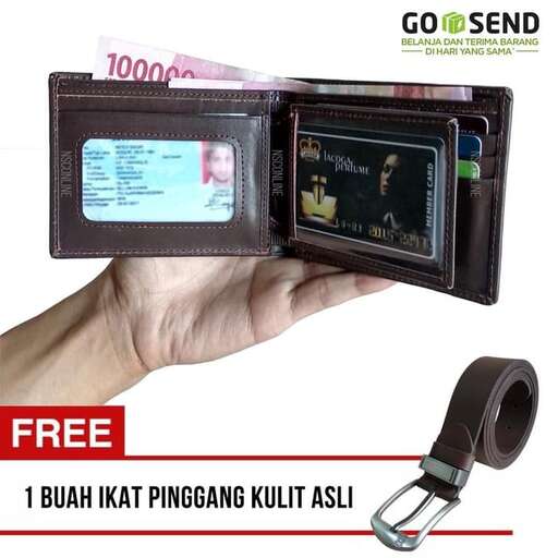 a hand holding a camera with a picture of a person holding it.