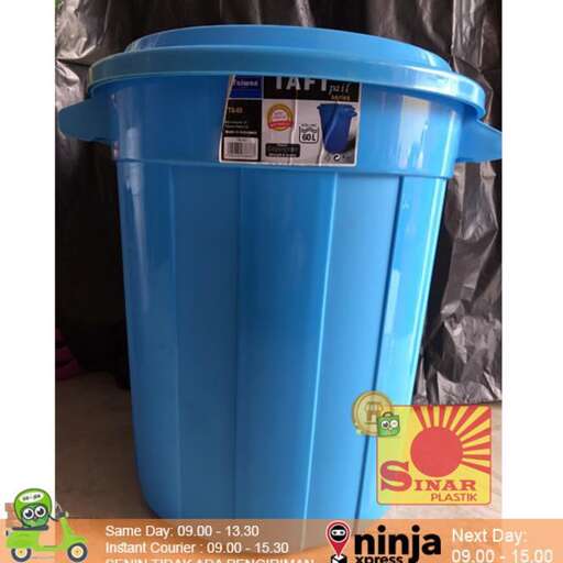 a blue trash can with a lid.